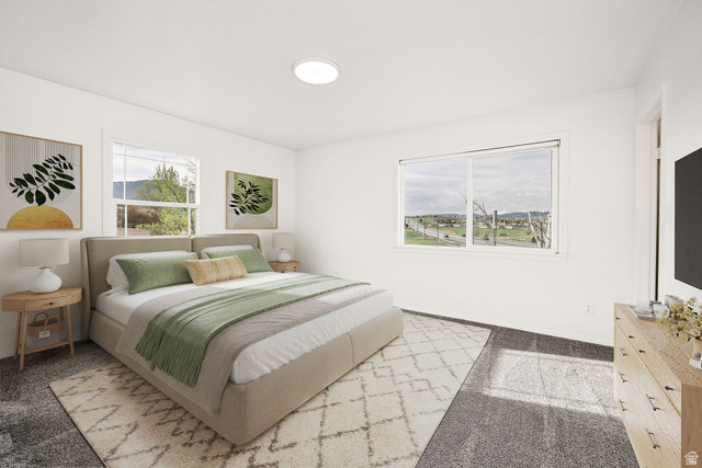 4155 Johnson Road Nibley, UT 84321 - Photo 25 of 71 Virtually staged. Room featuring three windows, a ceiling-mounted light fixture, and carpet flooring
