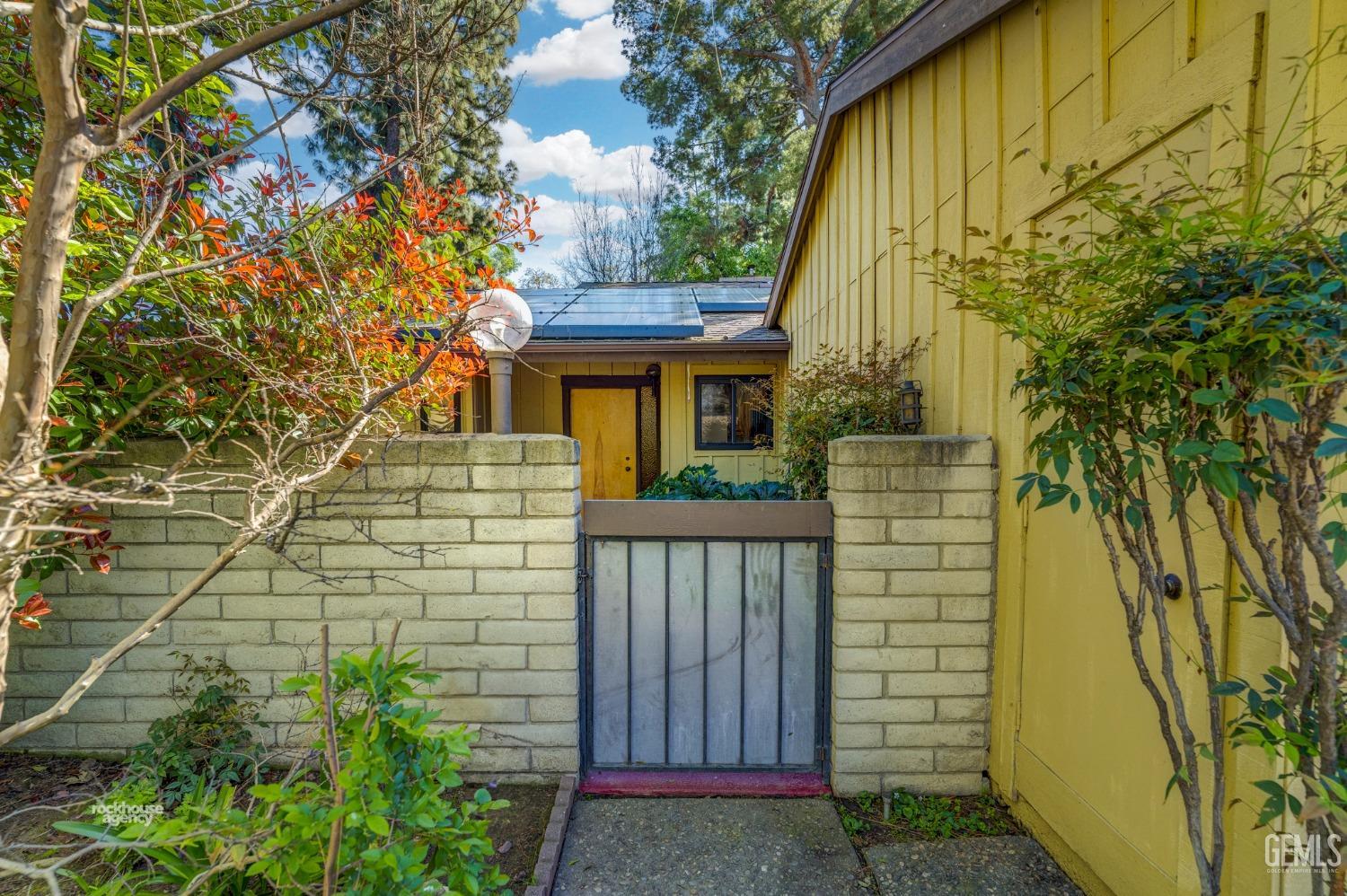 Undisclosed Address Bakersfield, CA 93306 - Photo 3 of 56 a view of front door of house