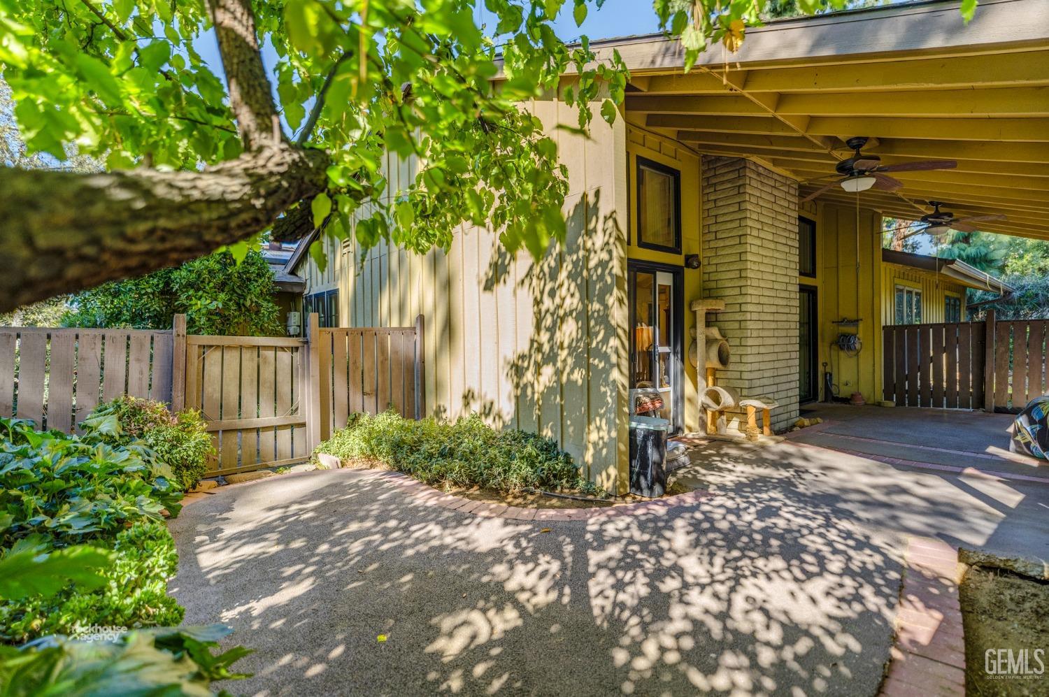 Undisclosed Address Bakersfield, CA 93306 - Photo 37 of 56 a front view of a house with a yard