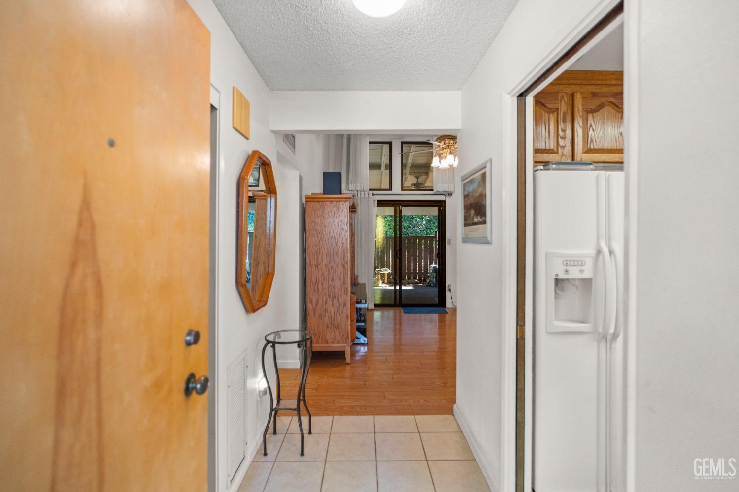 Undisclosed Address Bakersfield, CA 93306 - Photo 8 of 56 a view of entryway with livingroom and furniture