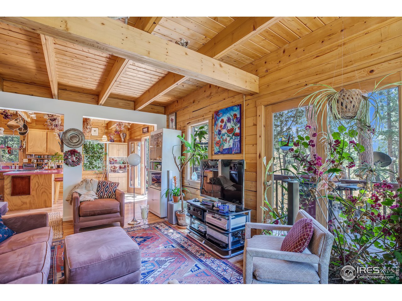 92 Tilghman Road Ward, CO 80481 - Photo 5 of 31 a living room filled with furniture