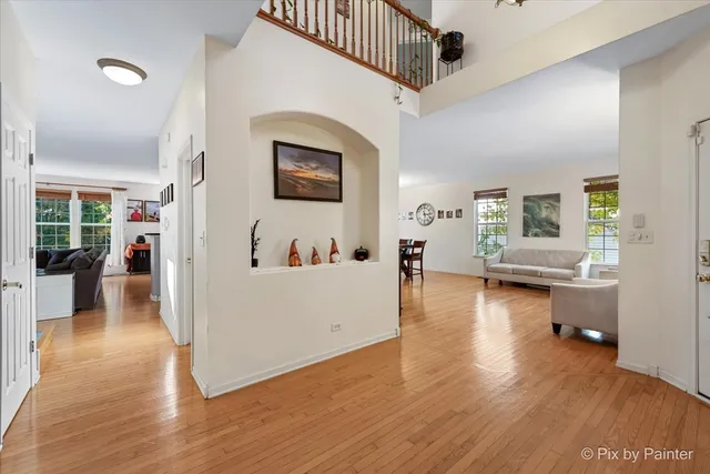 a view of a living room and hardwood floor