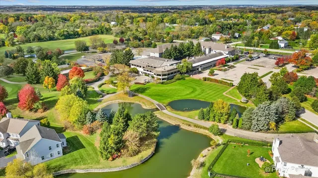 view of a lake with a house