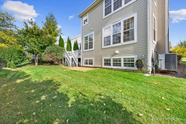 a view of house with yard