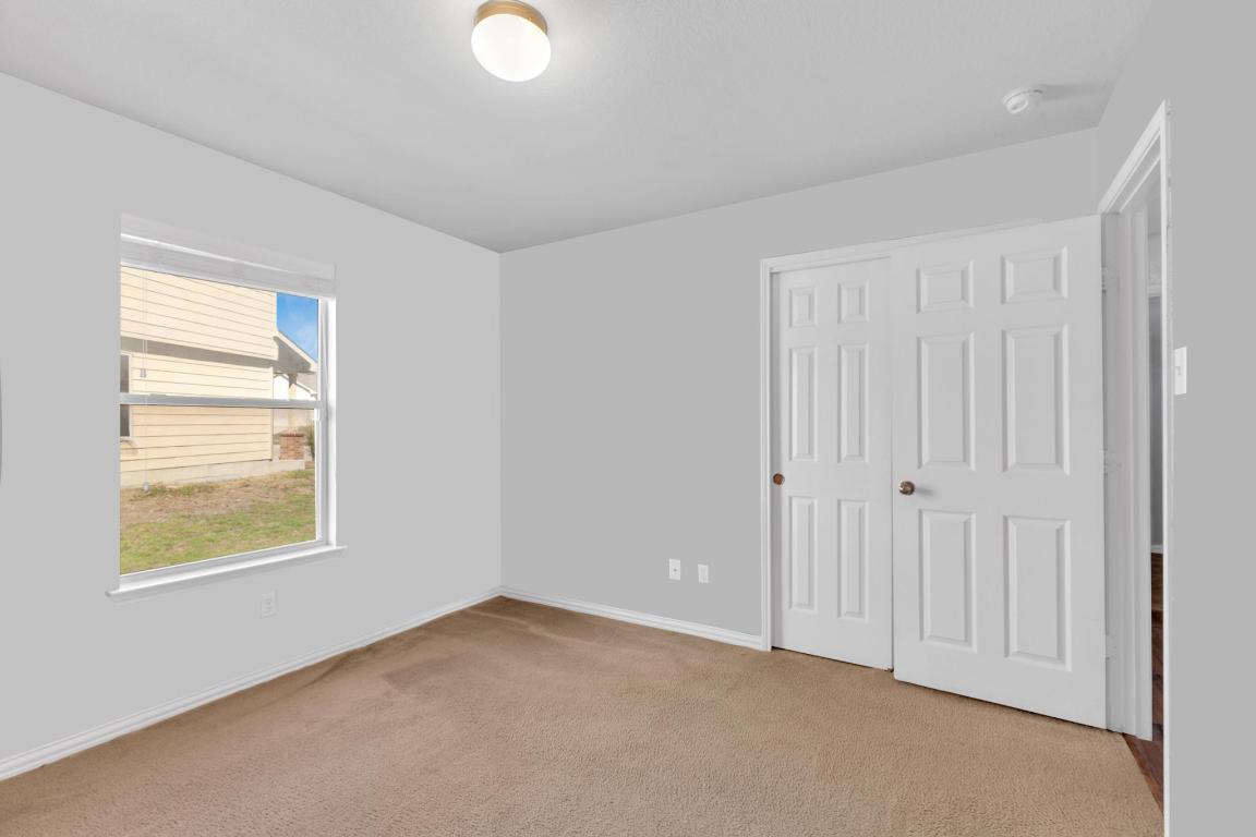 9301 Bellgrove Court Killeen, TX 76542 - Photo 14 of 22 an empty room with windows