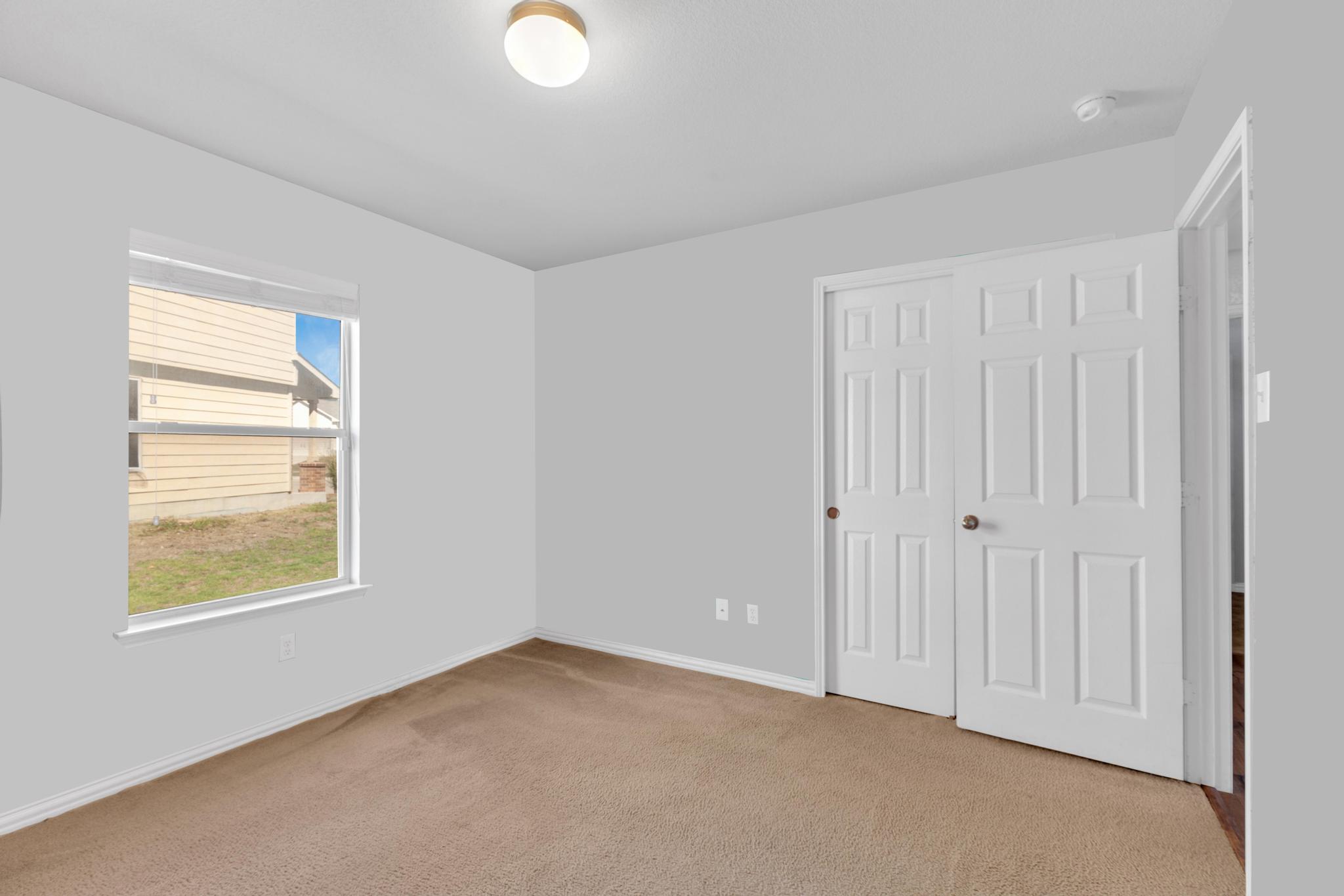 9301 Bellgrove Court Killeen, TX 76542 - Photo 15 of 22 an empty room with windows