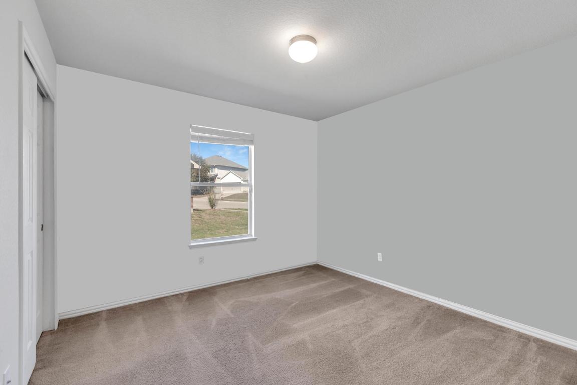 9301 Bellgrove Court Killeen, TX 76542 - Photo 16 of 22 an empty room with a window