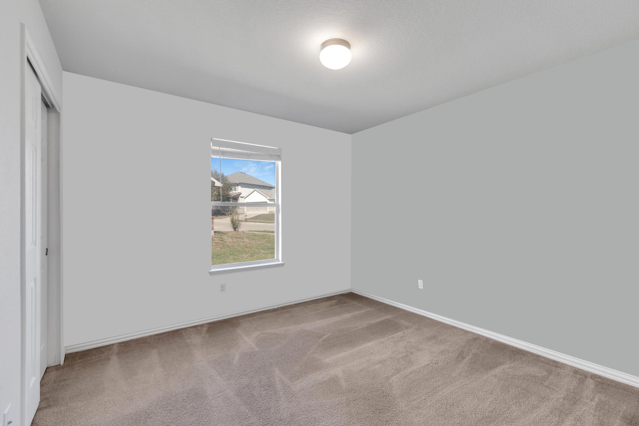 9301 Bellgrove Court Killeen, TX 76542 - Photo 17 of 22 an empty room with a window