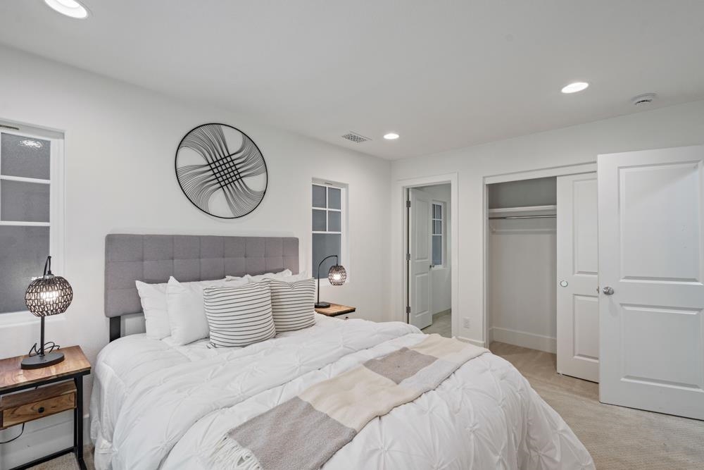 47236 Cavanaugh Common Fremont, CA 94539 - Photo 20 of 52 a bedroom with bed and a closet
