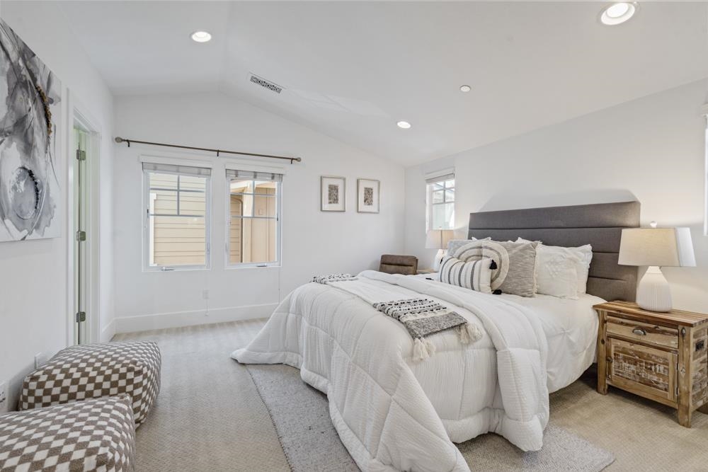 47236 Cavanaugh Common Fremont, CA 94539 - Photo 27 of 52 a bedroom with a bed and wooden floor