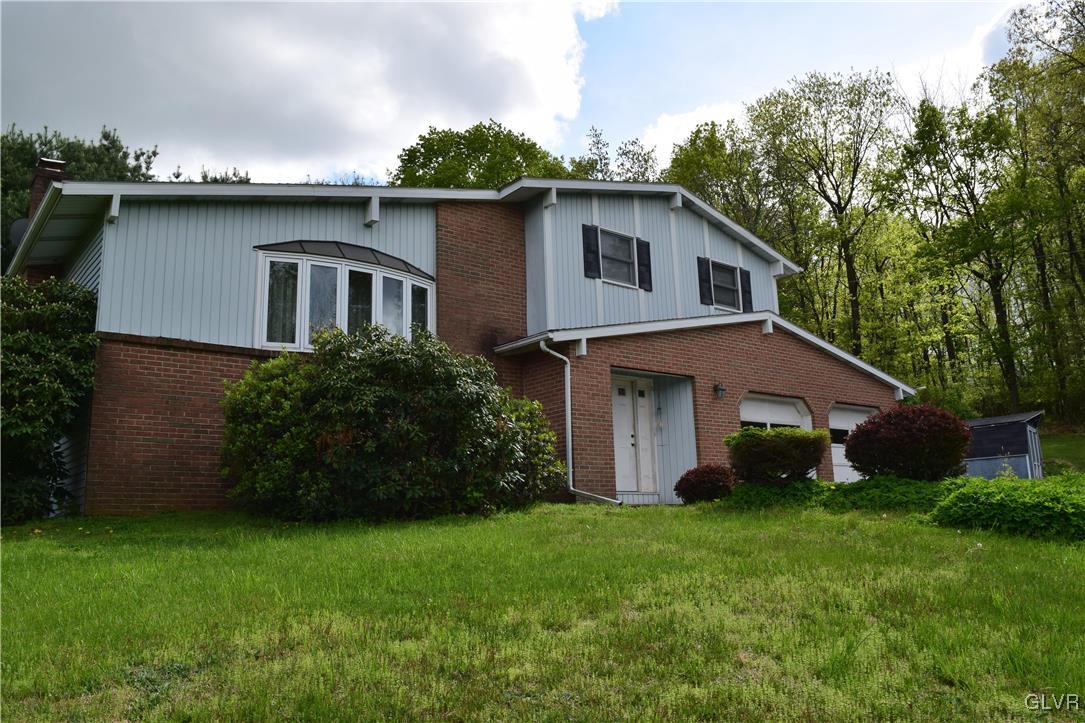 829 Copella Road Bath, PA 18014 - Photo 1 of 31 a front view of a house with garden