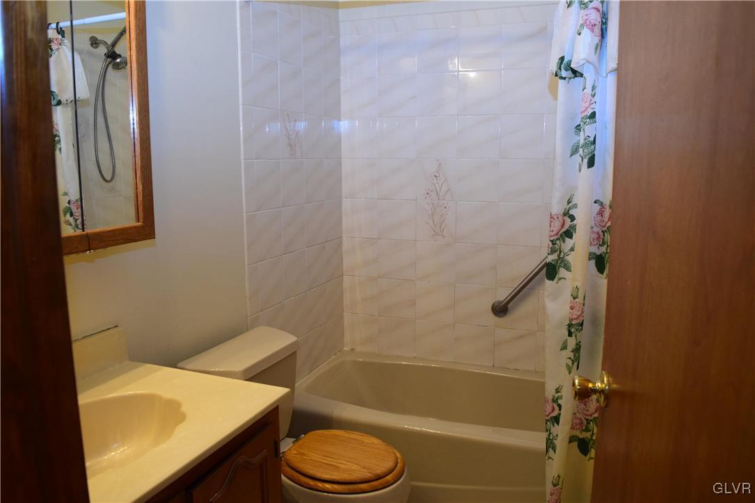 829 Copella Road Bath, PA 18014 - Photo 18 of 31 a bathroom with a sink a toilet and shower