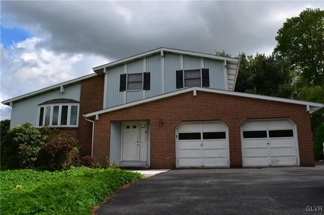 829 Copella Road Bath, PA 18014 - Photo 2 of 31 a front view of a house with garage