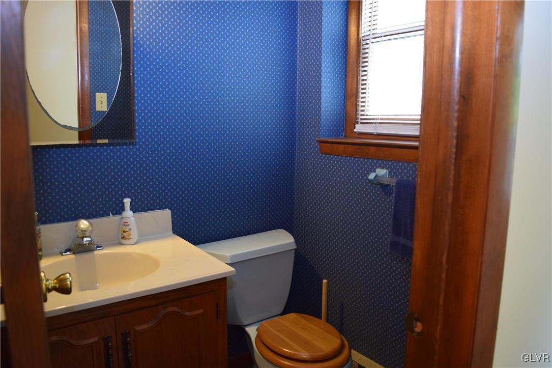 829 Copella Road Bath, PA 18014 - Photo 31 of 31 a bathroom with a toilet sink and mirror