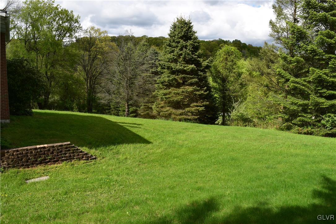 829 Copella Road Bath, PA 18014 - Photo 5 of 31 a view of a golf course with a garden