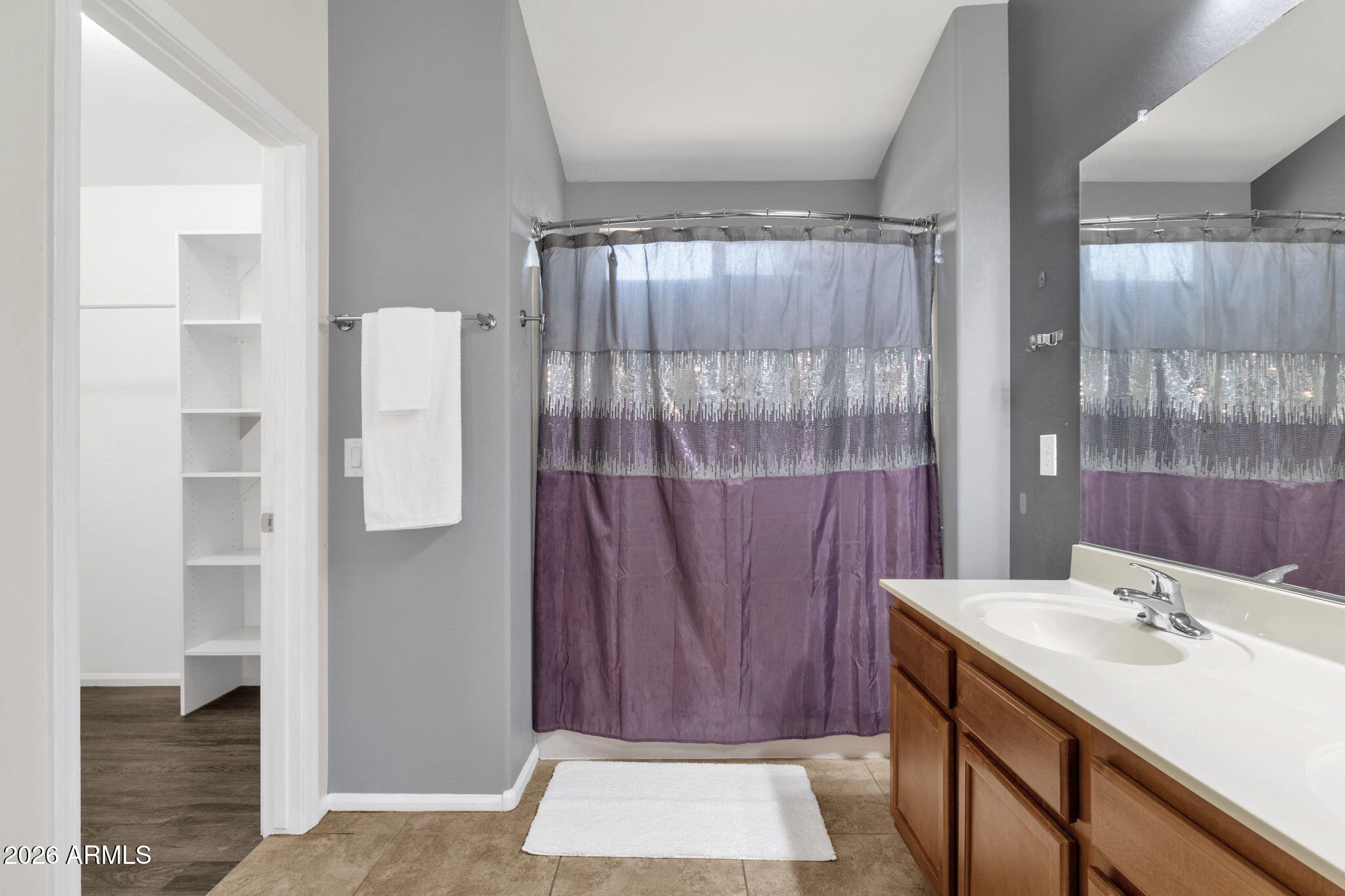 4629 West Carson Road Laveen, AZ 85339 - Photo 26 of 37 a bathroom with a sink and a mirror