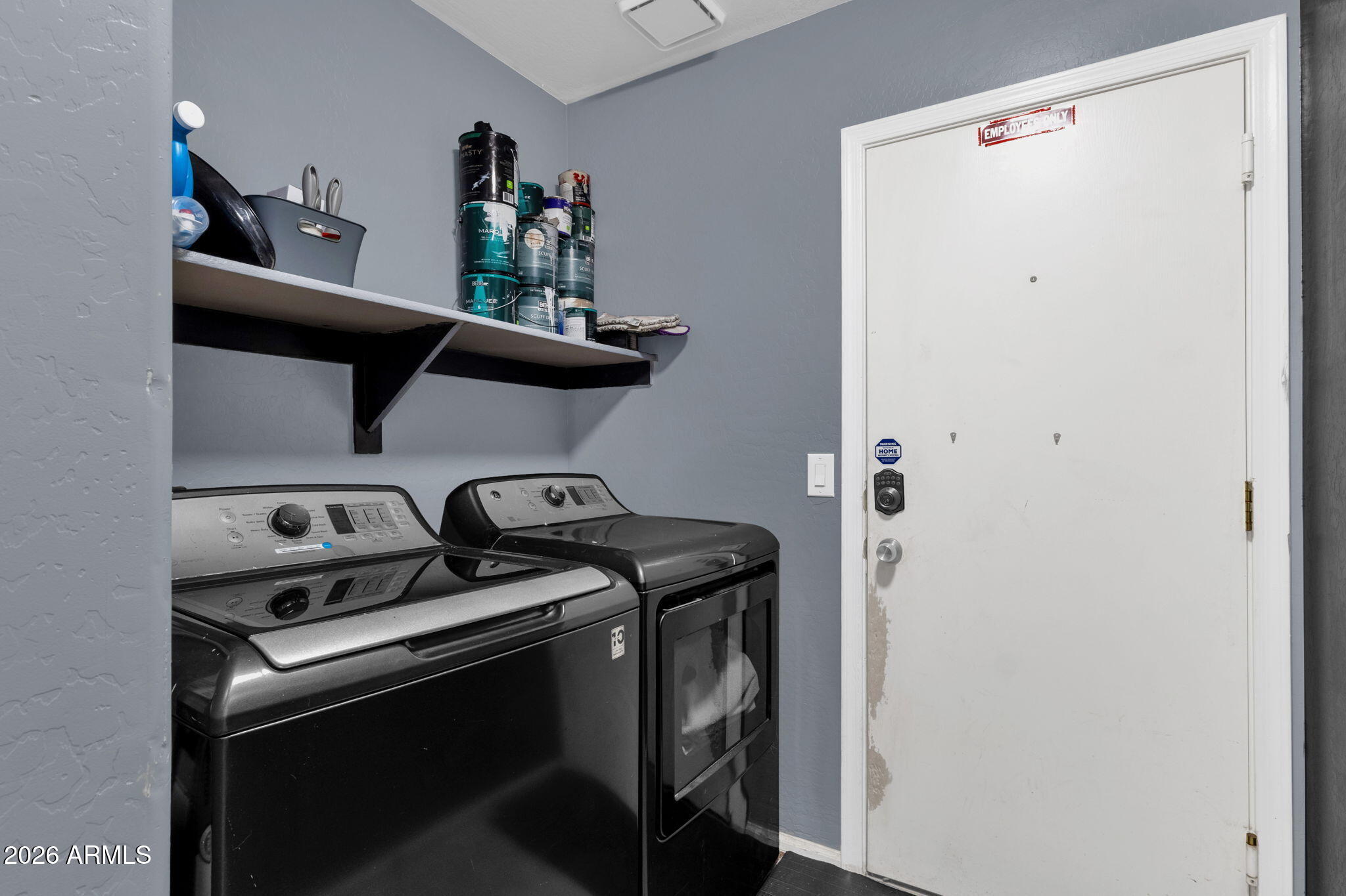4629 West Carson Road Laveen, AZ 85339 - Photo 28 of 37 a kitchen with a stove and a refrigerator