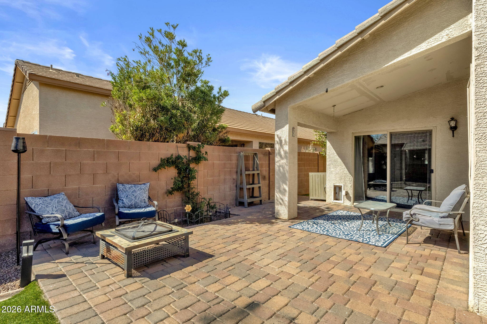 4629 West Carson Road Laveen, AZ 85339 - Photo 29 of 37 a outdoor space with a couch and chairs