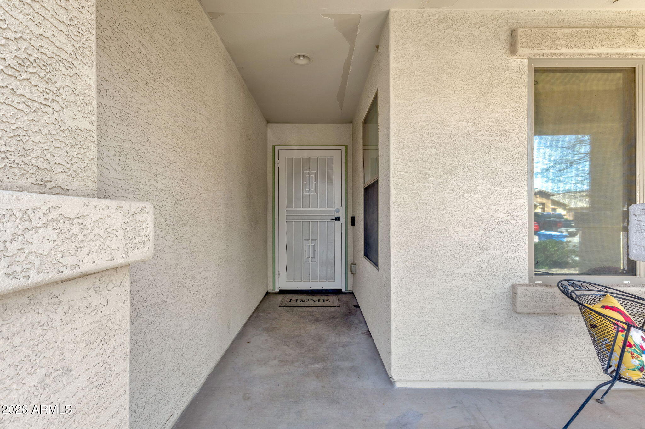 4629 West Carson Road Laveen, AZ 85339 - Photo 6 of 37 hallway with wooden floor and windows