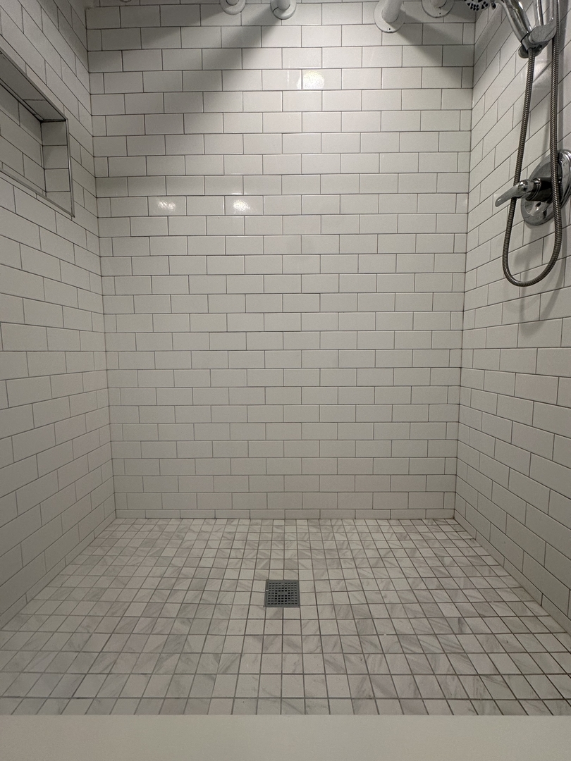 3016 South Throop Street, Unit GARDEN Chicago, IL 60608 - Photo 11 of 13 a bathroom with a shower