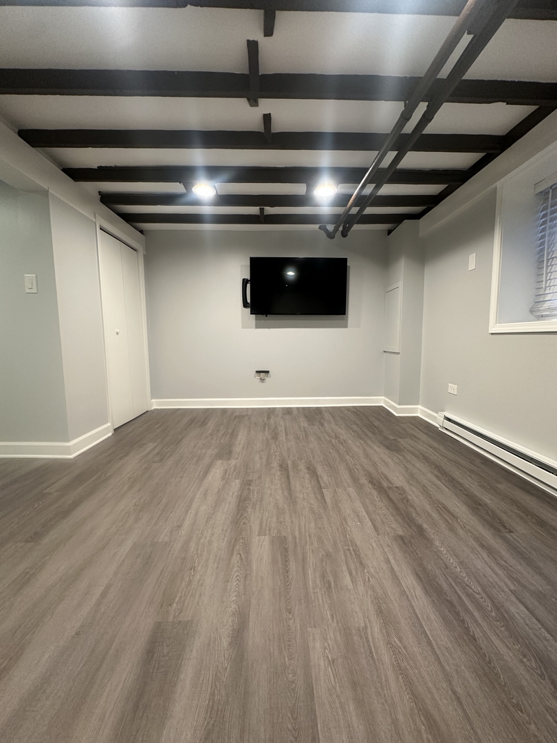 3016 South Throop Street, Unit GARDEN Chicago, IL 60608 - Photo 3 of 13 a view of an empty room