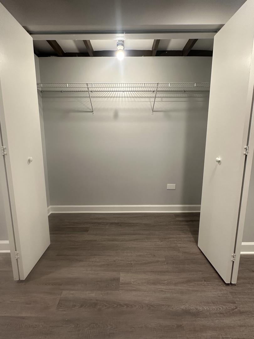 3016 South Throop Street, Unit GARDEN Chicago, IL 60608 - Photo 9 of 13 a view of an empty room