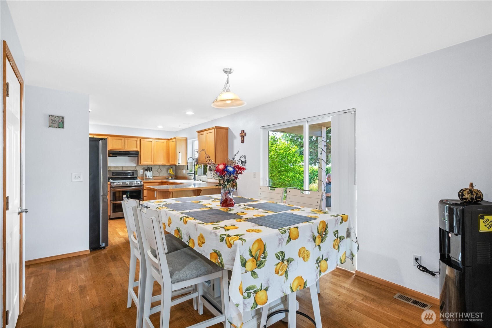 1877 Emerald Way Lynden, WA 98264 - Photo 15 of 38 a view of a dining room with furniture window and outside view
