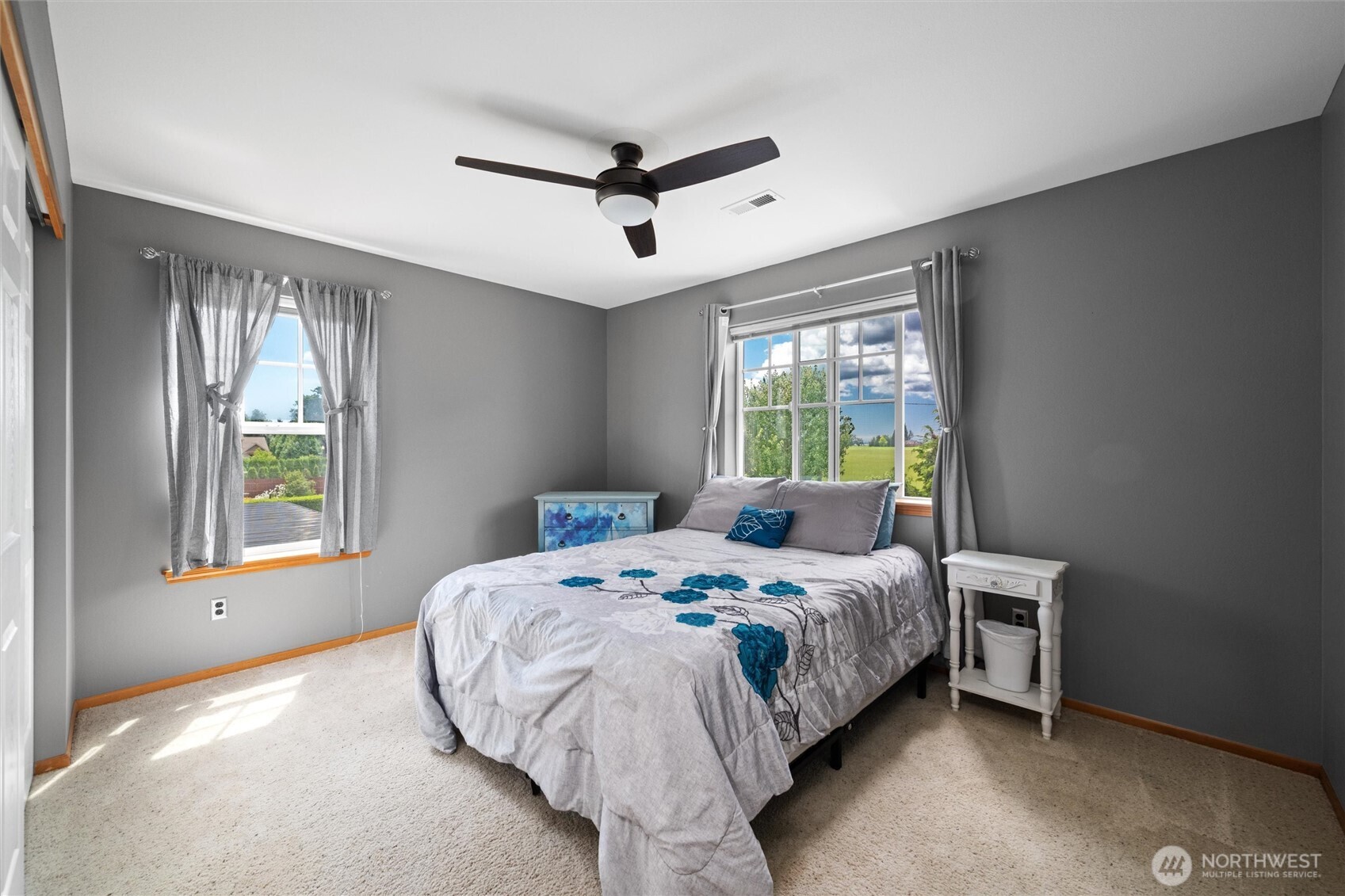 1877 Emerald Way Lynden, WA 98264 - Photo 25 of 38 a bedroom with a bed next to a window