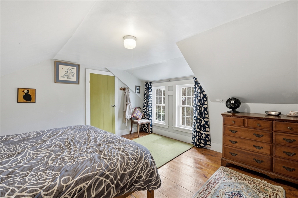 118 North Leverett Road Leverett, MA 01054 - Photo 19 of 26 a bedroom with a bed and a dresser