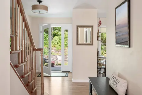 a view of entryway with wooden floor
