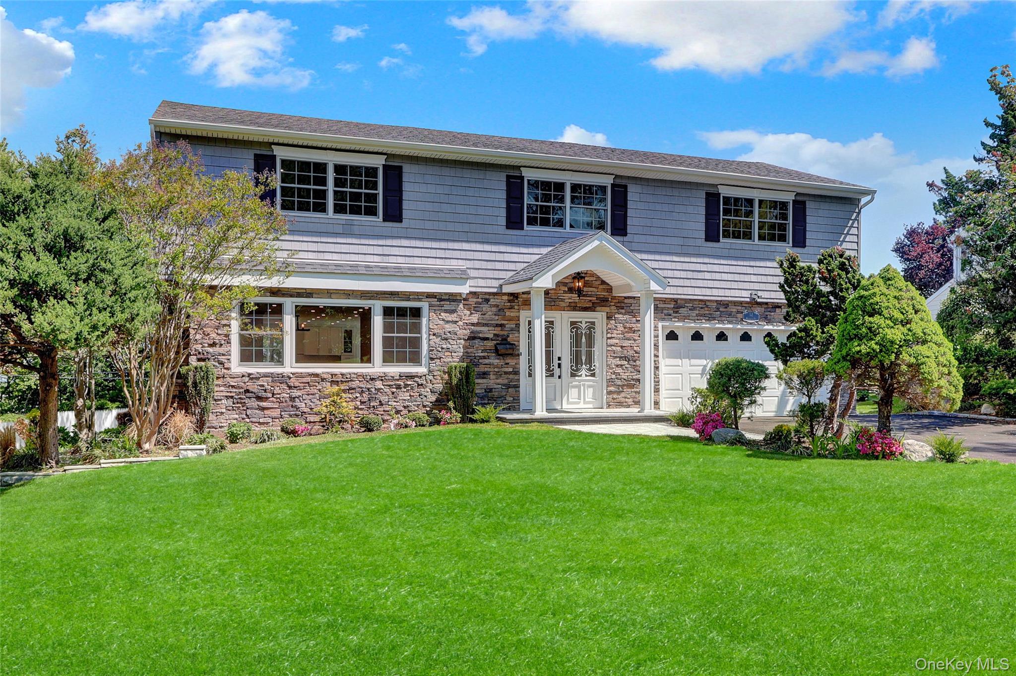 52 Woodland Road Roslyn, NY 11576 - Photo 3 of 50 Front