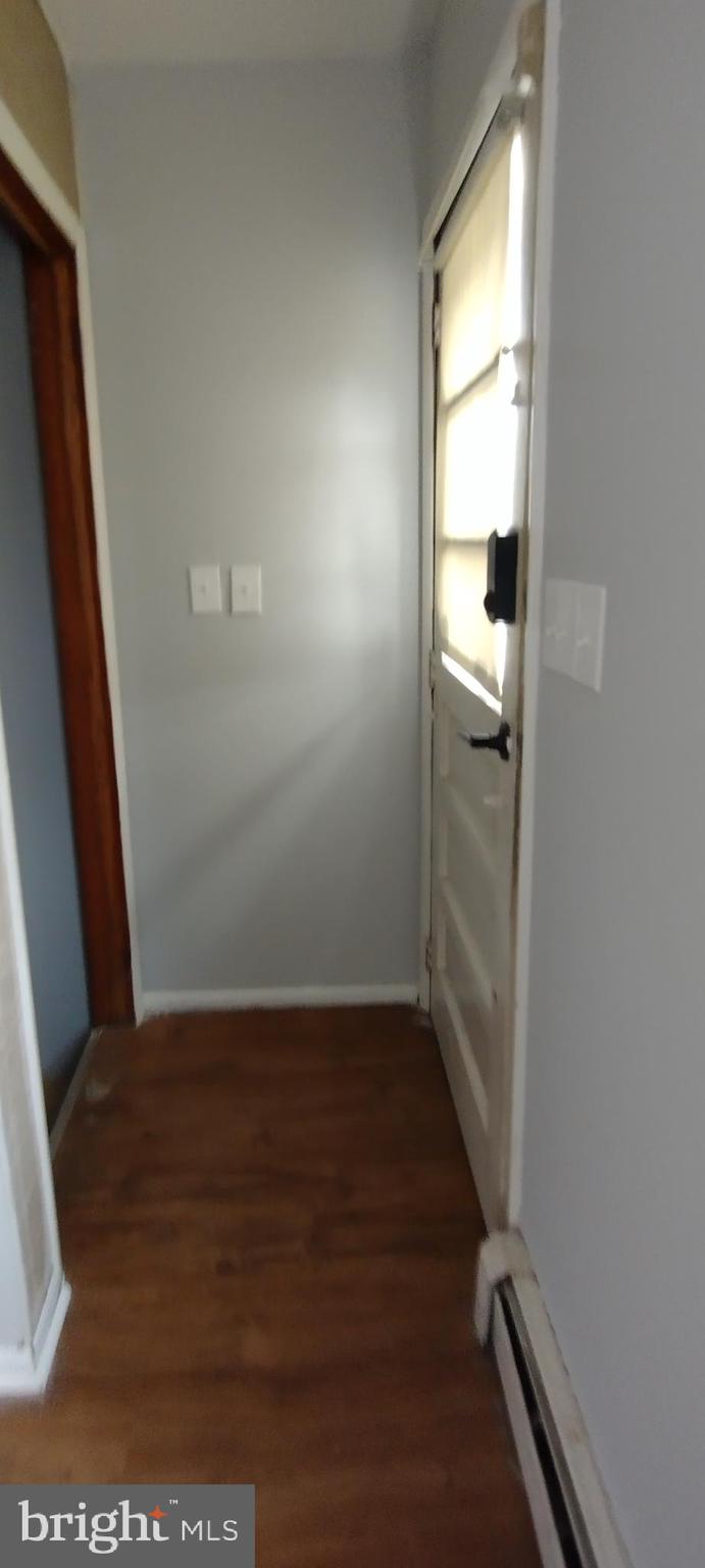 25853 Quinton Road Mardela Springs, MD 21837 - Photo 30 of 53 an empty room with wooden floor and windows