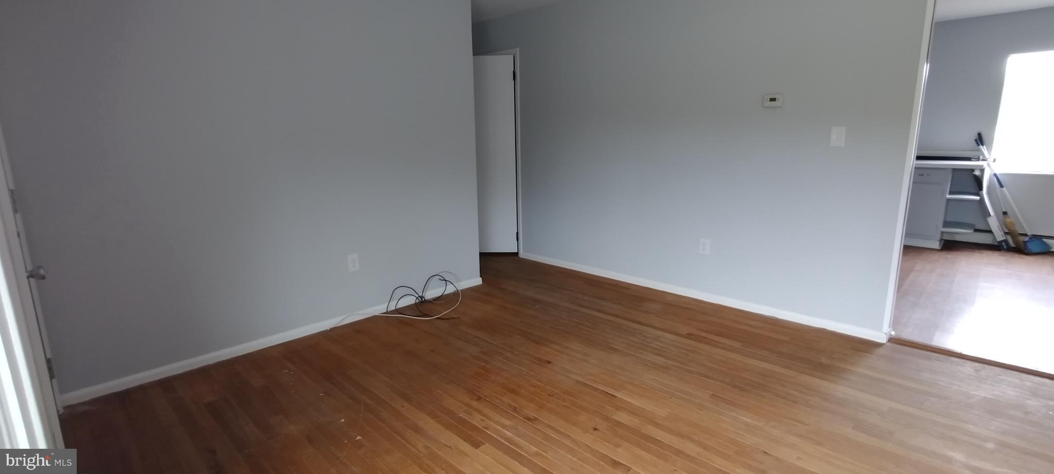 25853 Quinton Road Mardela Springs, MD 21837 - Photo 40 of 53 a view of empty room with wooden floor