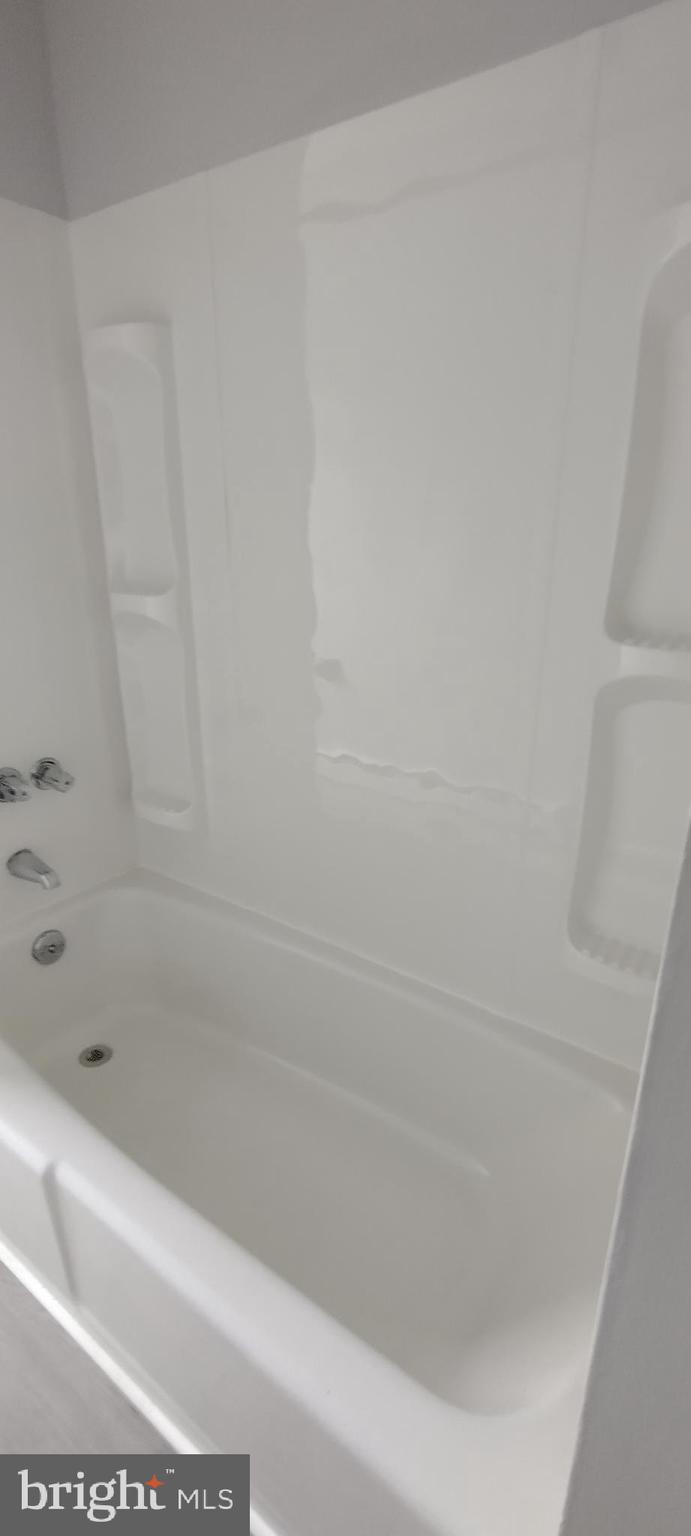 25853 Quinton Road Mardela Springs, MD 21837 - Photo 48 of 53 a close up of a bathtub with a shower