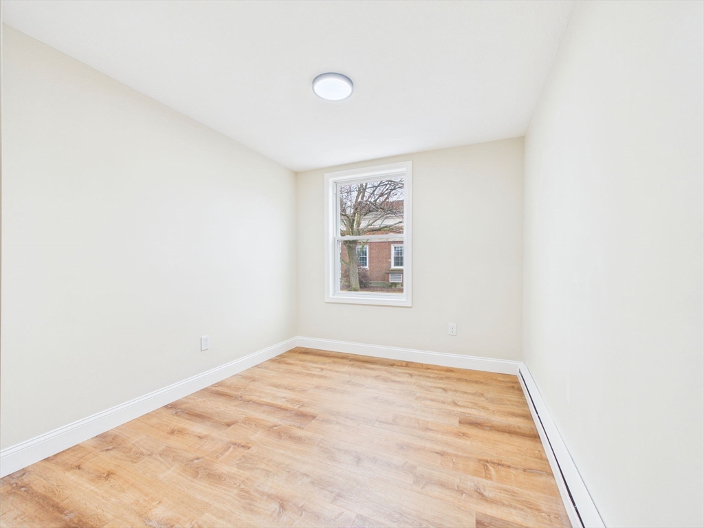 24 Middle Street Fairhaven, MA 02719 - Photo 18 of 38 a view of empty room with window