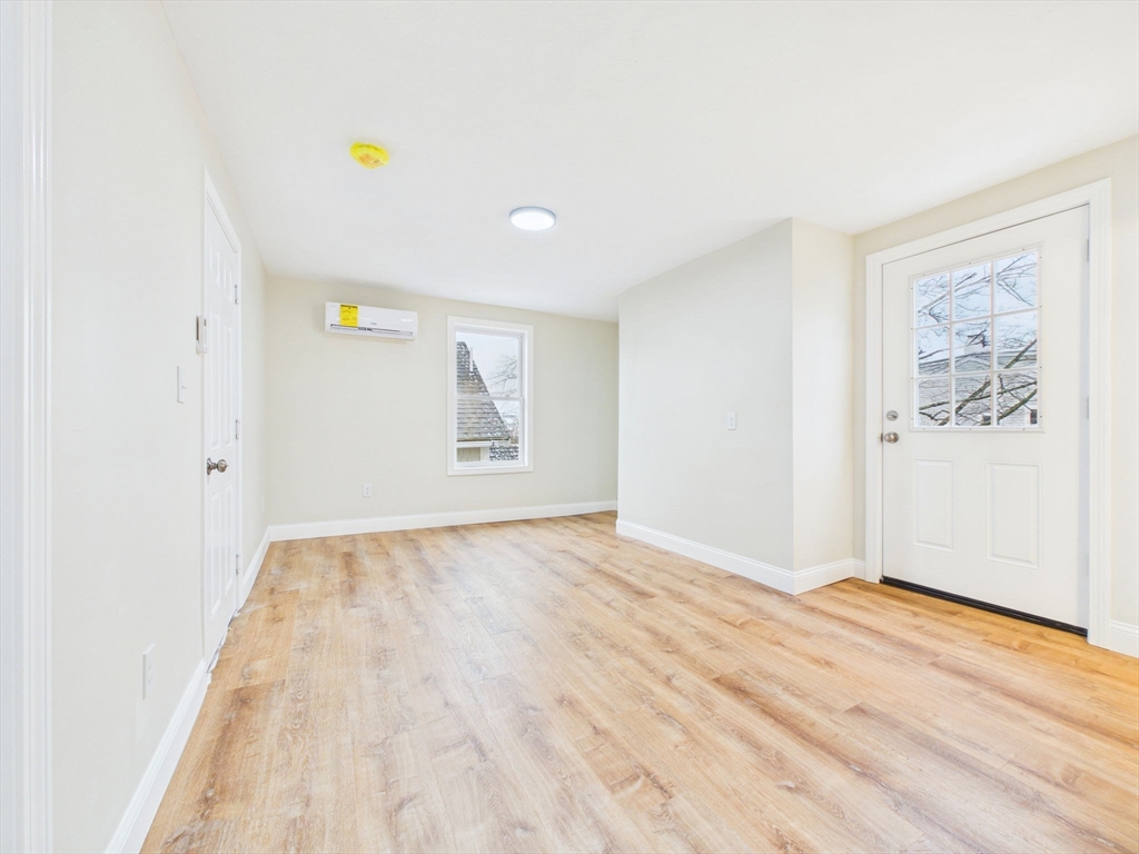 24 Middle Street Fairhaven, MA 02719 - Photo 24 of 38 a view of empty room with wooden floor and fan
