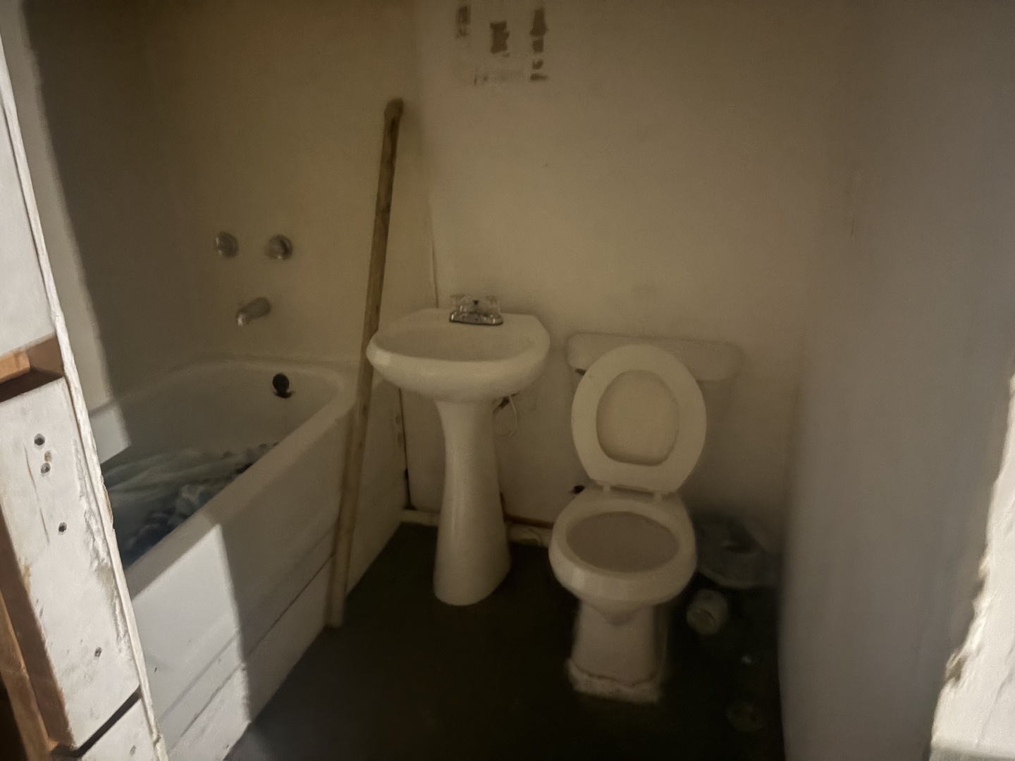 511 West 104th Street Chicago, IL 60628 - Photo 10 of 10 a bathroom with a sink and toilet