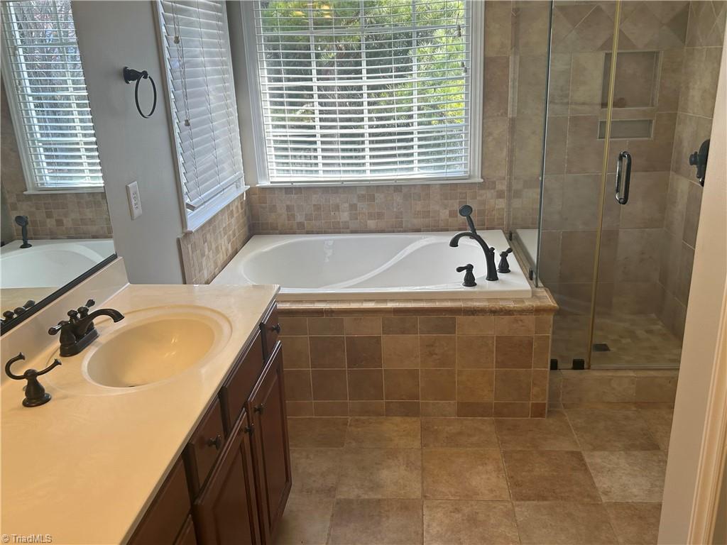3818 Pinetop Road Greensboro, NC 27410 - Photo 18 of 37 primary bath