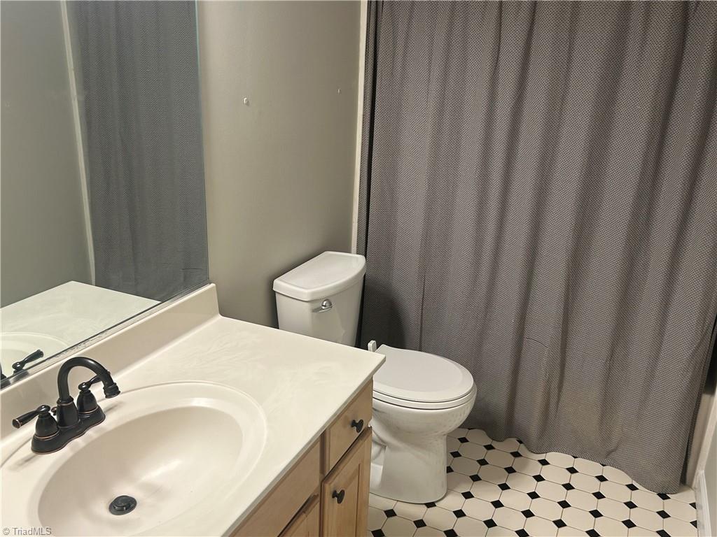 3818 Pinetop Road Greensboro, NC 27410 - Photo 23 of 37 hall bath