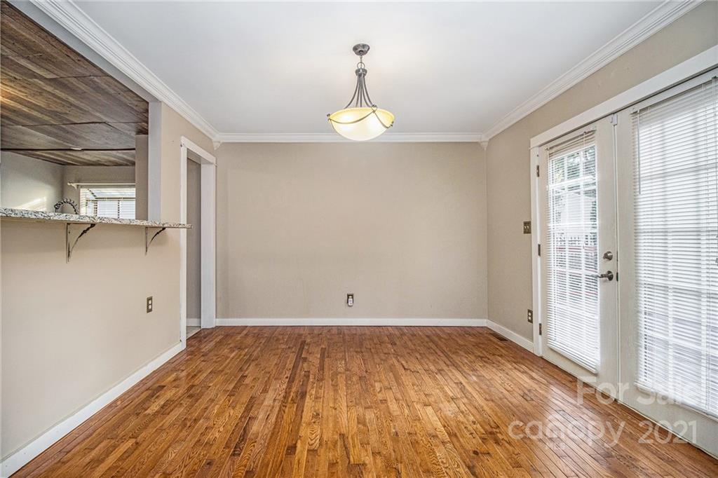 9618 Fairway Ridge Road Charlotte, NC 28277 - Photo 11 of 20 a view of a room with wooden floor and a window