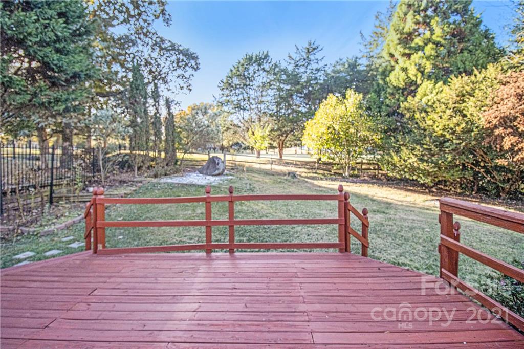 9618 Fairway Ridge Road Charlotte, NC 28277 - Photo 20 of 20 a view of a yard with wooden fence