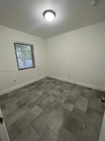 an empty room with a workbench