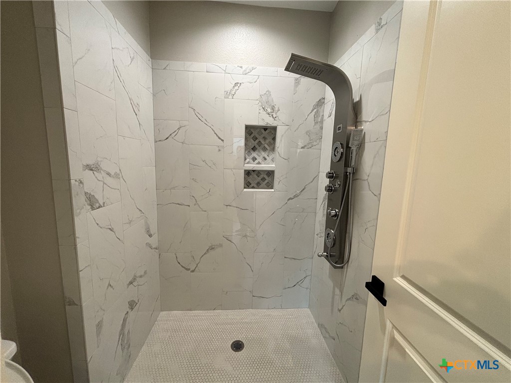 110 Hiram Cook Blanco, TX 78606 - Photo 46 of 46 a bathroom with a shower