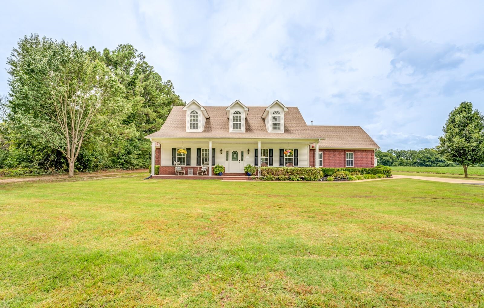 8649 Rankin Branch Road Millington, TN 38053 - Photo 1 of 34 Cape cod-style house featuring a porch and a front lawn