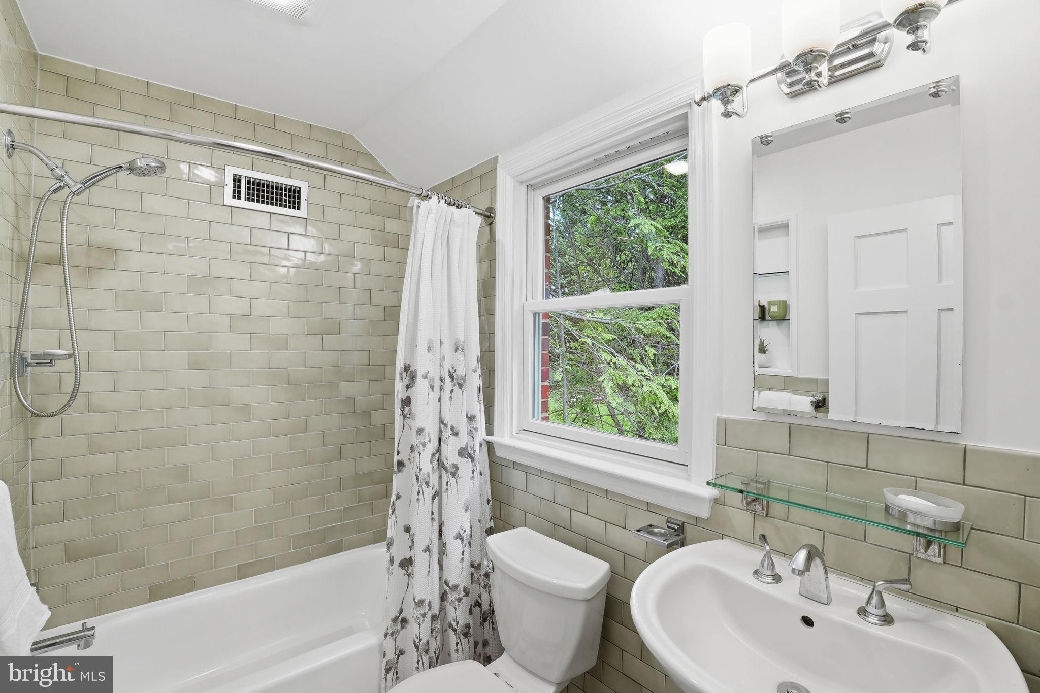 9601 Bruce Drive Silver Spring, MD 20901 - Photo 24 of 29 Serene bathroom with natural light.