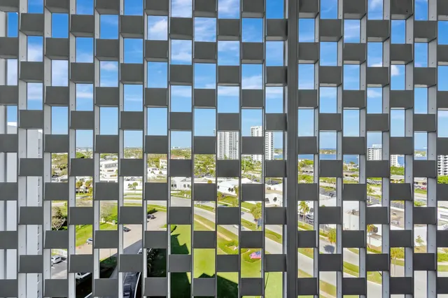 a view of a bathroom with a shower and a sink