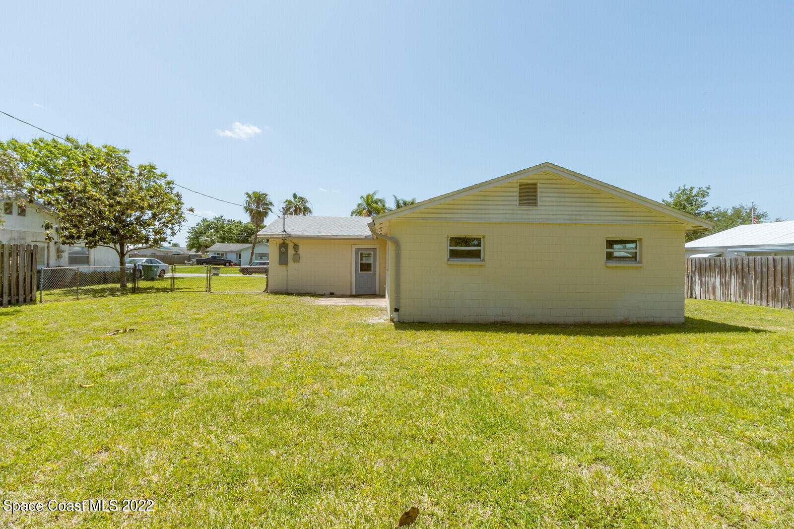 2834 Rheims Avenue Melbourne, FL 32935 - Photo 2 of 19 a front view of a house with a yard