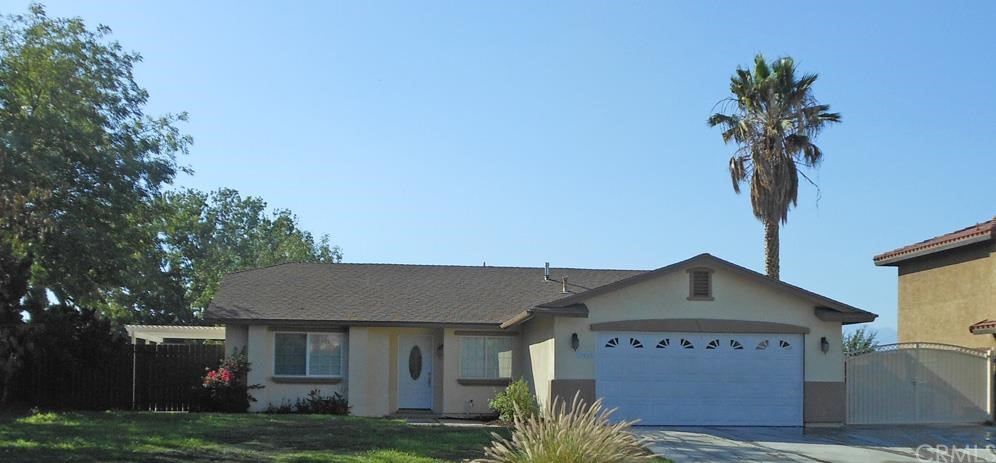 One story house with gated RV parking and large driveway
