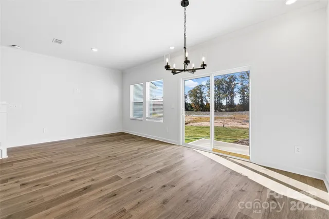 a view of a kitchen with appliances and cabinets