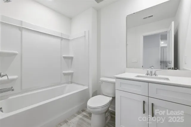 a view of a golf course with a big yard